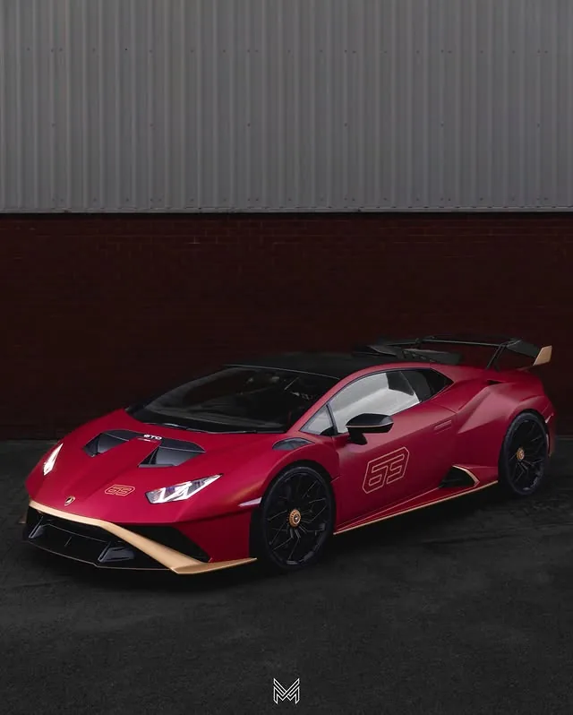 Lamborghini Huracán STO finished in a red and gold colour change wrap