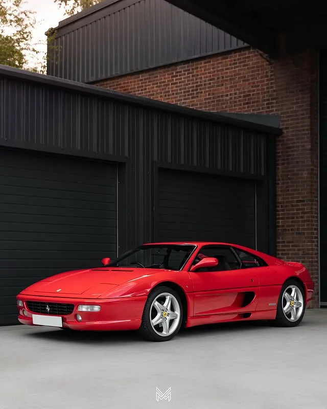 Classic red Ferrari F355, three-quarter view